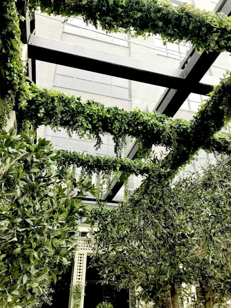 Exterior high level artificial planting to cover beams