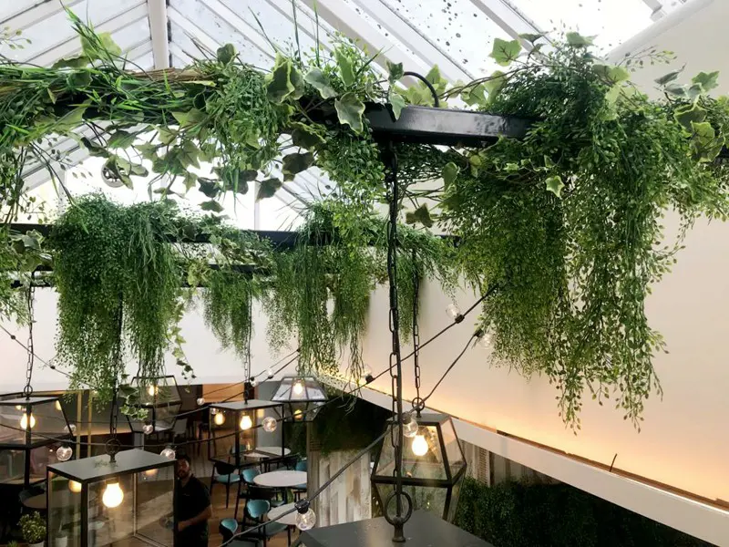 High Level artificial planting on interior steel beams