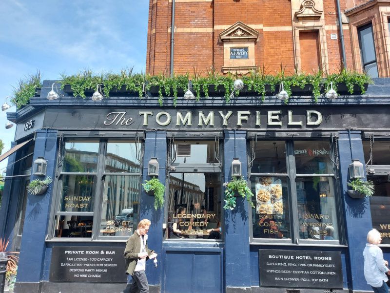 Tommyfield pub window boxes classical evergreen mix with white and burgundy